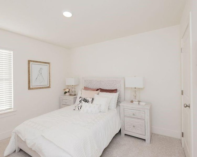 2686 NE Almand Ln NE, Conyers, GA 30013 - bedroom with light colored carpet and recessed lighting
