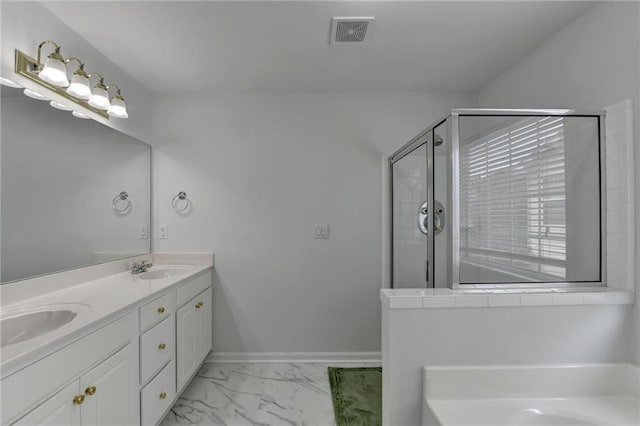 full bath with marble finish floor, visible vents, a stall shower, a sink, and baseboards