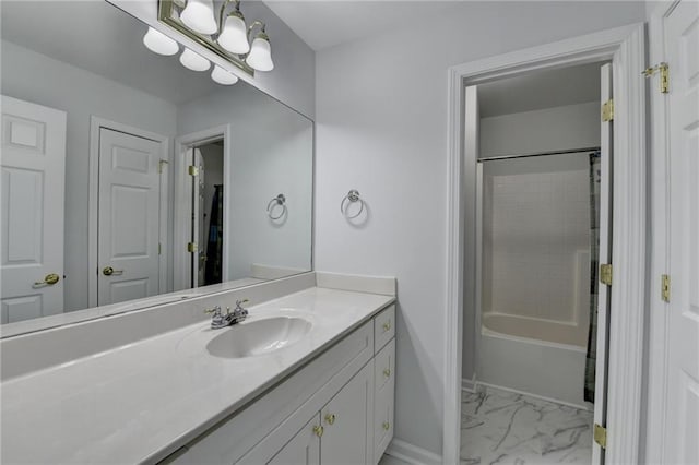 bathroom with a chandelier, shower / bath combination, vanity, baseboards, and marble finish floor