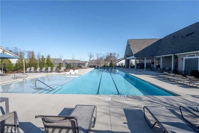 view of pool featuring a patio