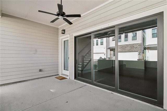 balcony featuring ceiling fan