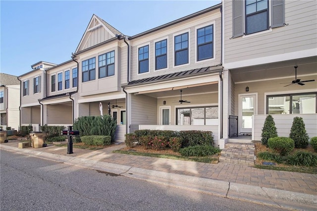 671 Stickley Oak Way, Woodstock, GA 30189 - townhome / multi-family property with a ceiling fan, a standing seam roof, covered porch, and metal roof