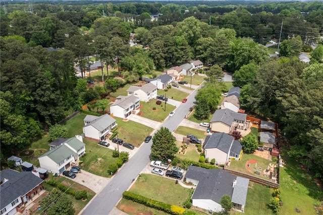 bird's eye view with a residential view and a view of trees