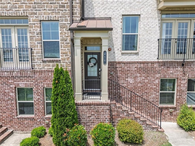 416 Montclair Ct, Woodstock, GA 30188 - property entrance with a standing seam roof and brick siding