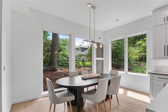 dining room featuring light wood-type flooring