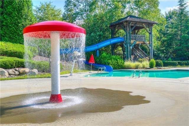 view of play area featuring an outdoor pool