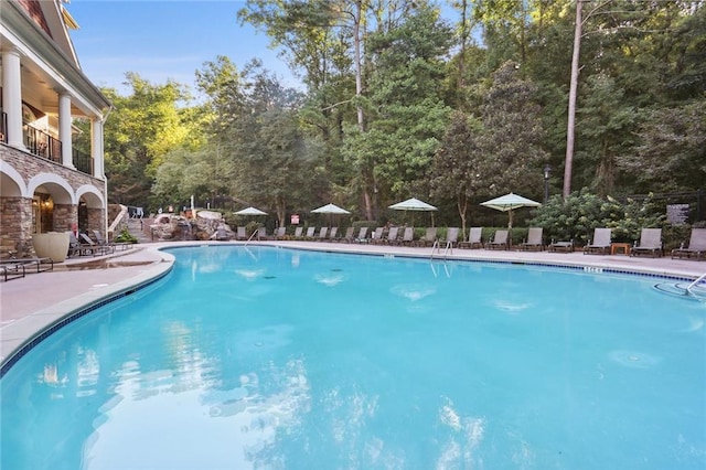 community pool with a patio