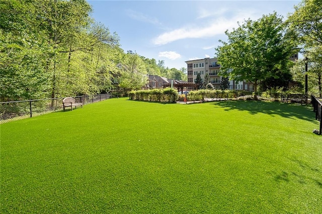 view of yard featuring fence