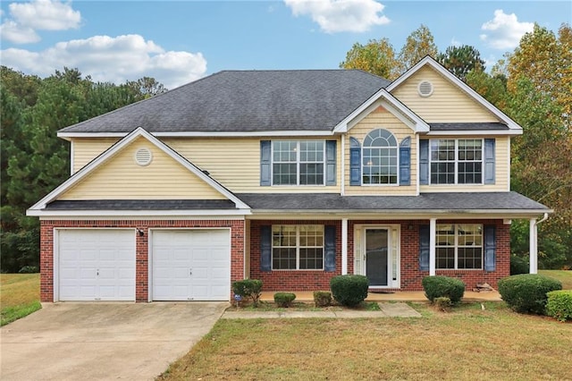 view of front of home featuring a front lawn and covered porch