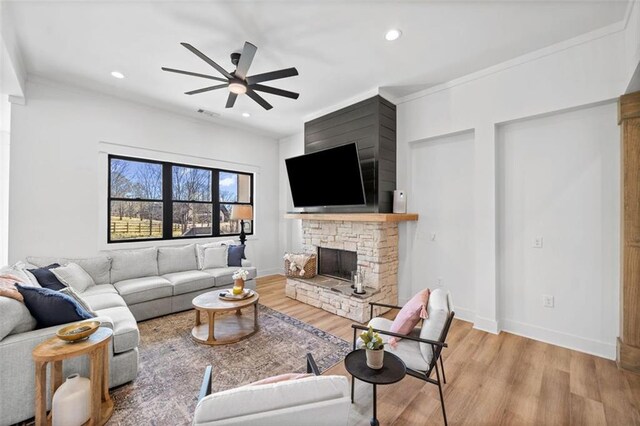 kitchen featuring range hood, light countertops, stainless steel double oven, a sink, and gas cooktop