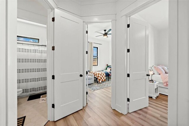 hallway featuring light wood-type flooring