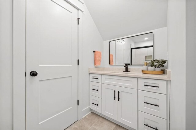 bedroom featuring ceiling fan, light wood finished floors, ensuite bath, and visible vents