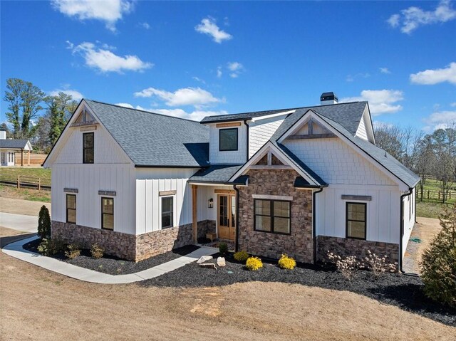 exterior space featuring ceiling fan, fence, an outdoor living space, a grill, and a trampoline