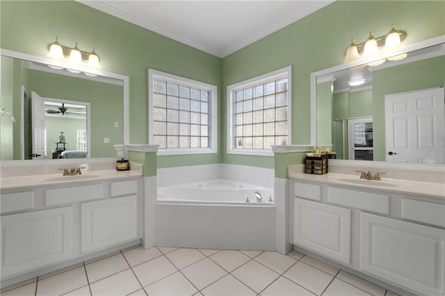 bathroom with a relaxing tiled tub, ceiling fan, tile patterned floors, ornamental molding, and vanity