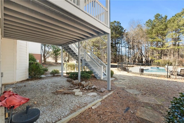 view of yard with a fenced in pool