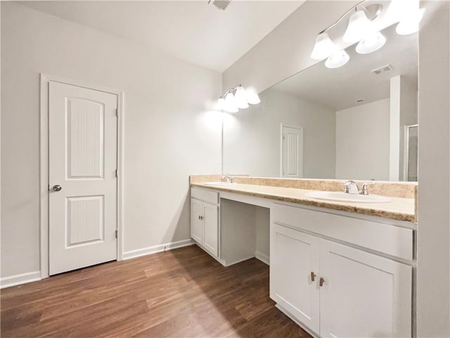 36 Crescent, Dallas, GA 30157 - full bathroom with double vanity, wood finished floors, and a shower