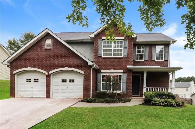 view of front of house featuring a garage, a porch, and a front yard