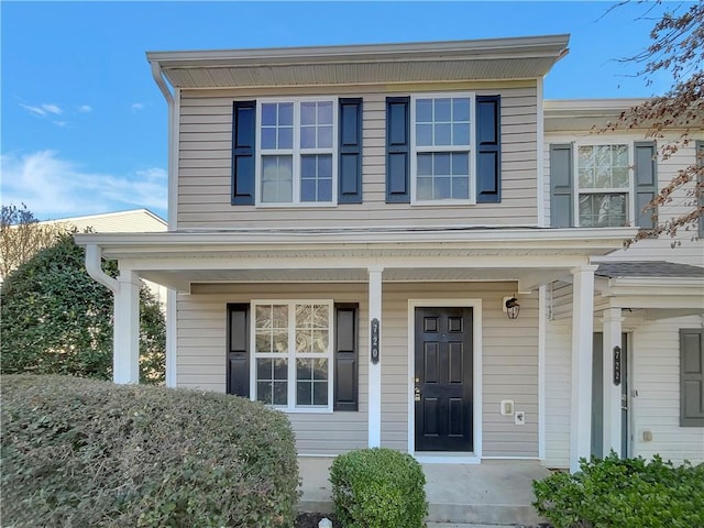 view of front of property featuring covered porch