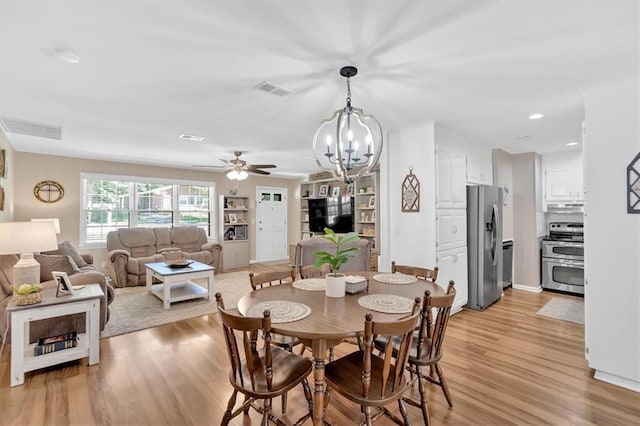 10 Shadow Ln, Cartersville, GA 30120 - dining area featuring a chandelier, ceiling fan, and light wood-style floors