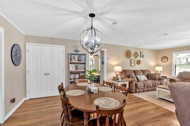 10 Shadow Ln, Cartersville, GA 30120 - dining area with a chandelier, light wood-style floors, and ornamental molding