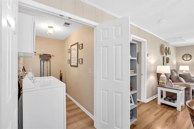 10 Shadow Ln, Cartersville, GA 30120 - laundry area with light wood-style floors, baseboards, and washer and dryer