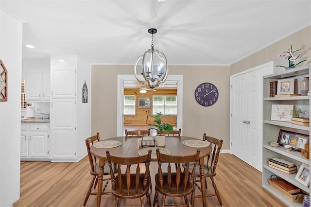10 Shadow Ln, Cartersville, GA 30120 - dining room with light wood-style floors, a chandelier, and ornamental molding