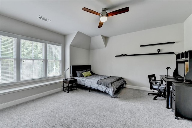 bedroom with visible vents, a ceiling fan, baseboards, and carpet floors
