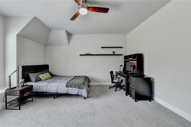 bedroom featuring baseboards, a ceiling fan, and carpet