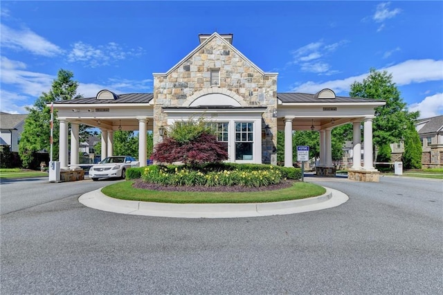 view of property featuring driveway