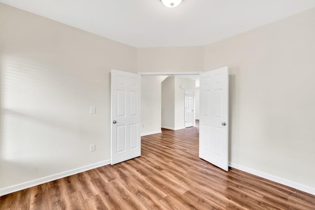 1530 Avalon Creek Rd, Sugar Hill, GA 30518 - spare room with wood finished floors and baseboards