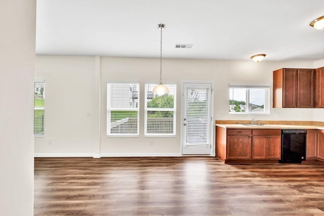 1530 Avalon Creek Rd, Sugar Hill, GA 30518 - kitchen with dishwasher, a sink, and dark wood-type flooring