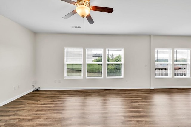 1530 Avalon Creek Rd, Sugar Hill, GA 30518 - empty room with wood finished floors, baseboards, and ceiling fan