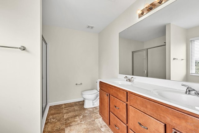 1530 Avalon Creek Rd, Sugar Hill, GA 30518 - full bath with a shower stall, double vanity, baseboards, and toilet