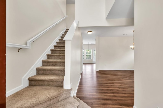 1530 Avalon Creek Rd, Sugar Hill, GA 30518 - stairs with wood finished floors and baseboards