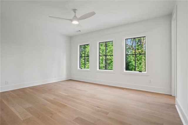 4785 Merlendale Ct, Atlanta, GA 30327 - unfurnished room with healthy amount of natural light, baseboards, and light wood finished floors