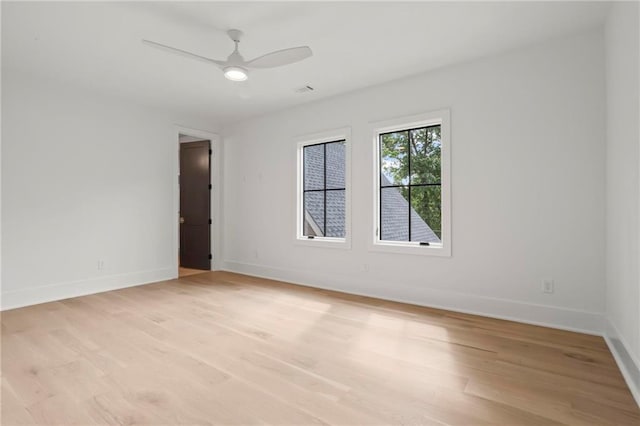 4785 Merlendale Ct, Atlanta, GA 30327 - empty room with light wood-style flooring, baseboards, and ceiling fan
