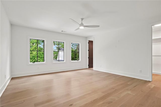 4785 Merlendale Ct, Atlanta, GA 30327 - spare room with ceiling fan, light wood-style floors, and baseboards