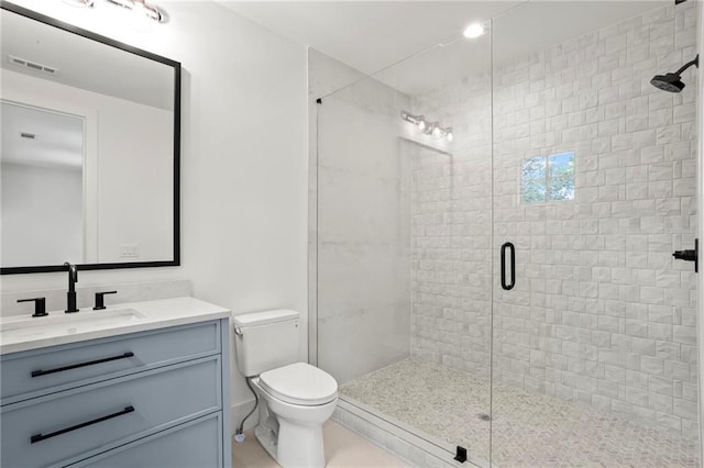 4785 Merlendale Ct, Atlanta, GA 30327 - bathroom with a shower stall, toilet, vanity, and tile patterned flooring