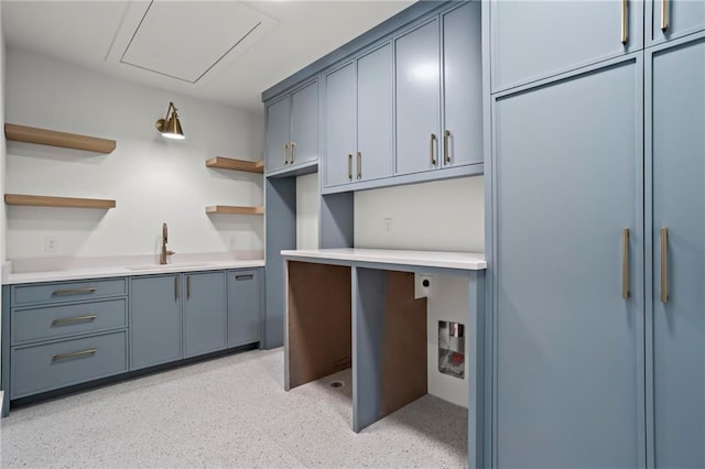 4785 Merlendale Ct, Atlanta, GA 30327 - kitchen featuring open shelves, a sink, light countertops, and dark speckled floor