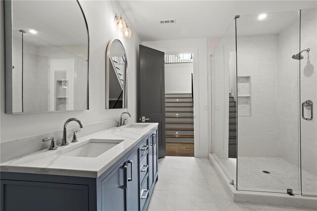 4785 Merlendale Ct, Atlanta, GA 30327 - bathroom with a stall shower, double vanity, and marble finish flooring