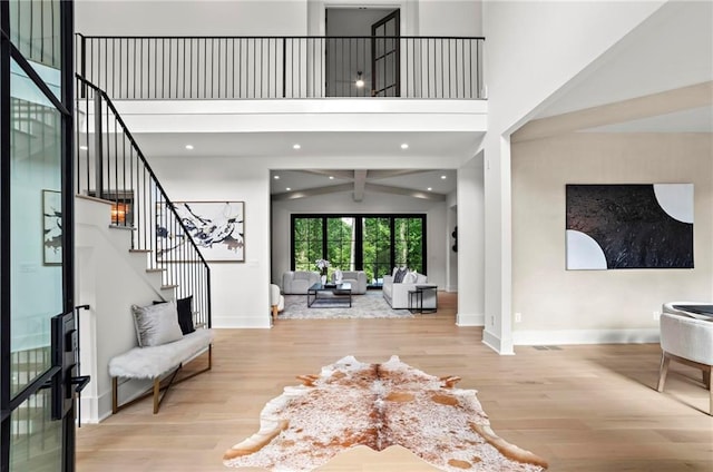 4785 Merlendale Ct, Atlanta, GA 30327 - entryway featuring stairway, wood finished floors, baseboards, a high ceiling, and recessed lighting