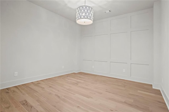 4785 Merlendale Ct, Atlanta, GA 30327 - empty room with light wood-type flooring and baseboards