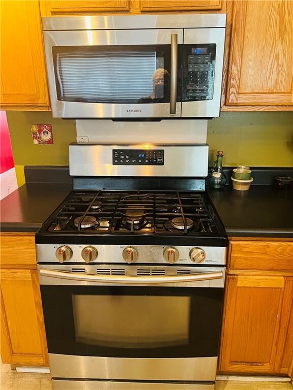 kitchen with appliances with stainless steel finishes