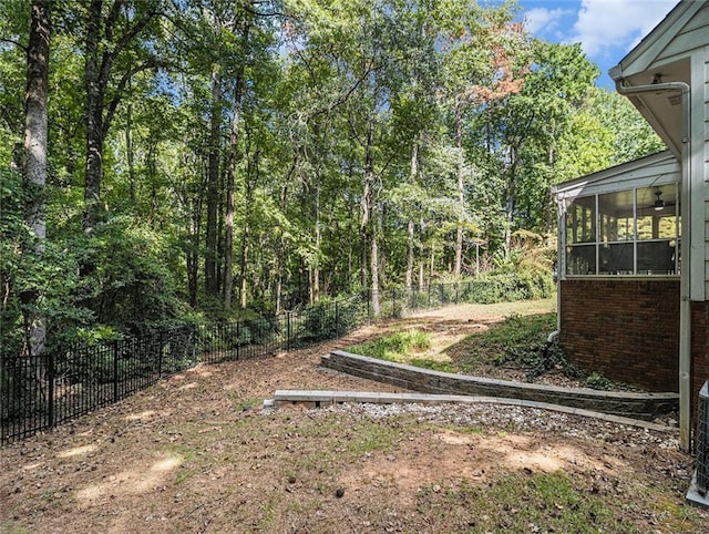 view of front of home with a sunroom and central air condition unit