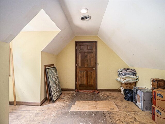 bathroom with tile patterned floors, walk in shower, vanity, wooden walls, and crown molding