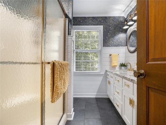 bathroom featuring vanity, hardwood / wood-style flooring, and ornamental molding