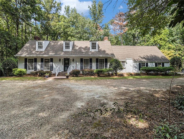 cape cod house with covered porch