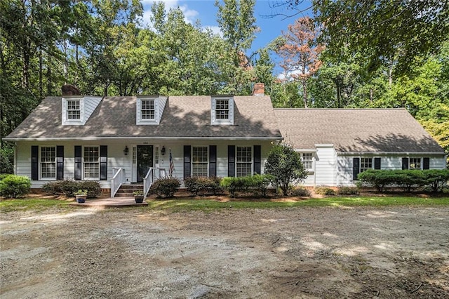 cape cod home with covered porch