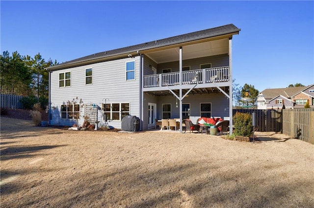 back of property featuring a patio area