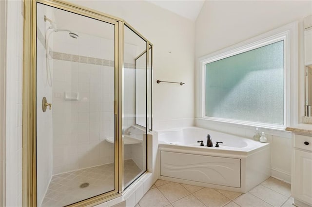 1125 Fairview Club Cir, Dacula, GA 30019 - bathroom with a bath, a shower stall, and tile patterned flooring